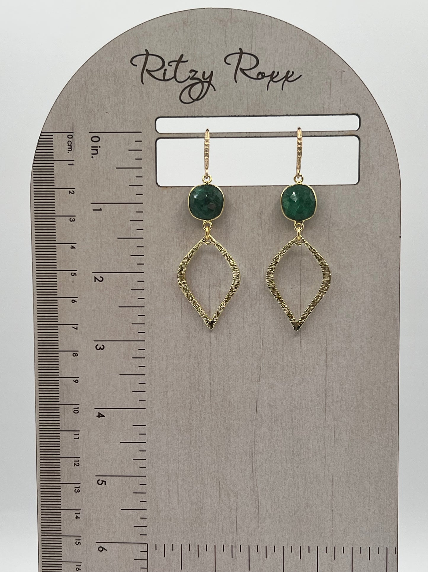 Gold Chain Necklace with Emerald Cushion Cut Stones.