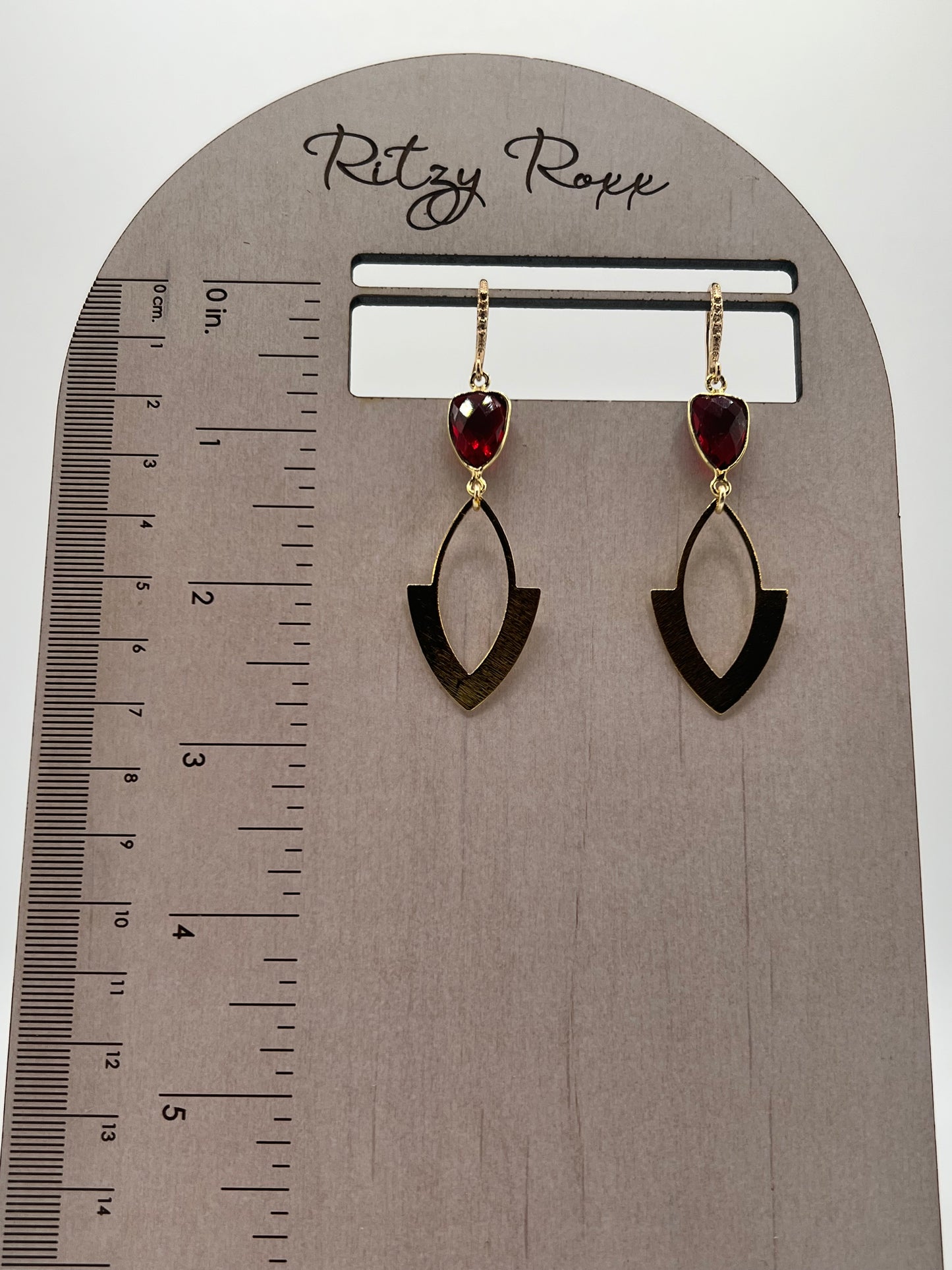 Gold Gemstone Earring with Ruby Quartz Trillion and a Brushed Gold Arrowhead Charm